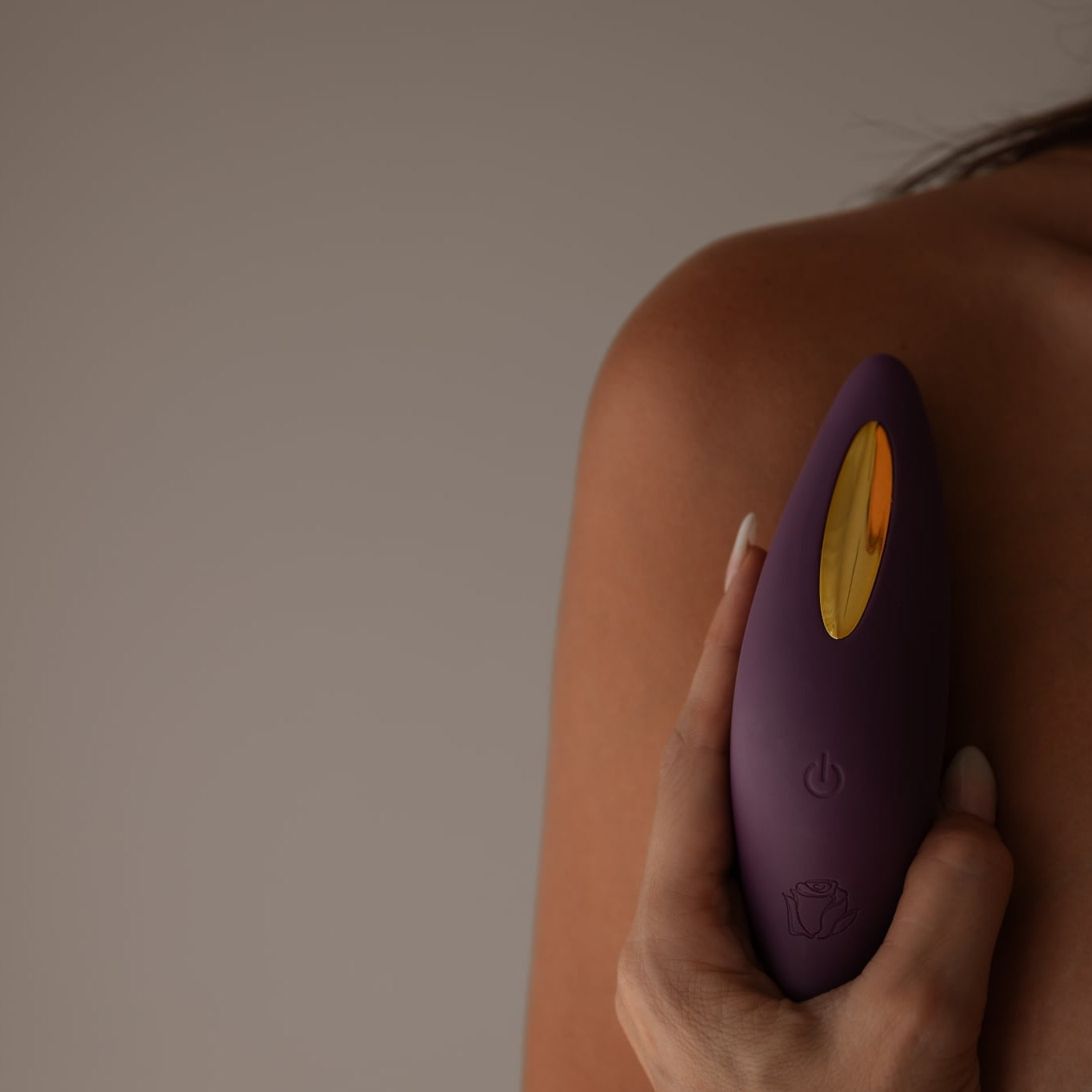 Air pulse being held by naked woman 